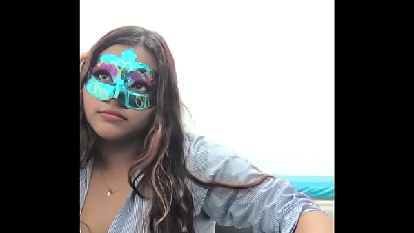 Brunette student takes the questionnaire before going to exams. She touches her breasts in a sexy way.