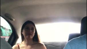beautiful student changes clothes in the back seat of the uber