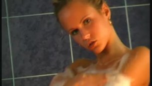 big breast babe takes a hot shower