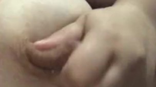 Milf plays with breasts