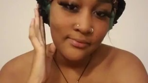 Ebony fucks herself and plays with clit