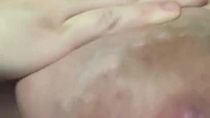 Hand expressing my breastmilk